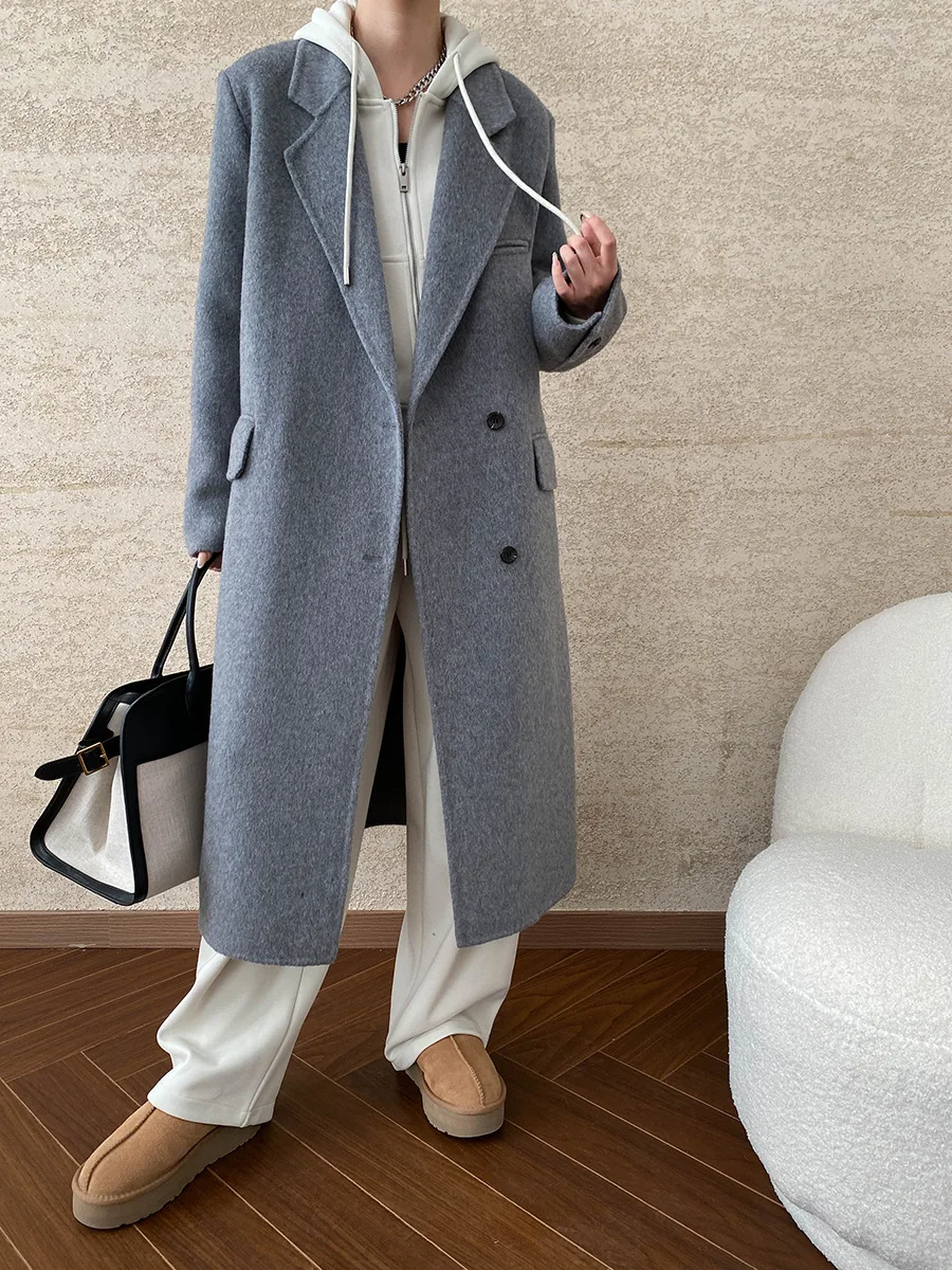 Winter women\'s casual solid color lapel long sleeved pocket decoration loose long coat