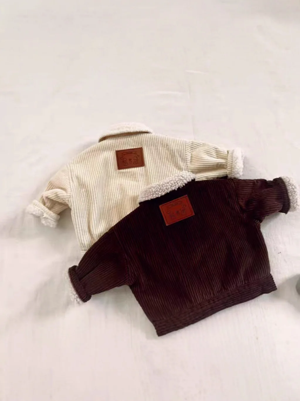 2025年冬新作ベビー長袖フリースコート幼児女児綿入りジャケットプラスベルベット厚手幼児男児暖かいコーデュロイコート