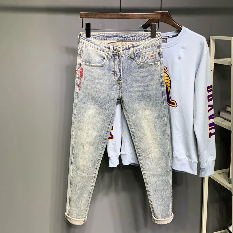 

Summer Trendy Light Blue Embroidered Slim Fit Men's Jeans Casual Retro Long Pants Youth Faion mid Waist Zipper ket Jeans