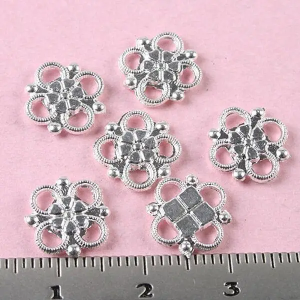 100pcs 10MM WIDE Silver tone lucky knot connectors h0167