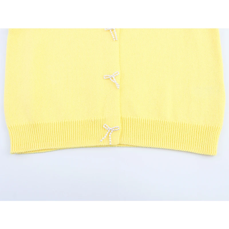 YENKYE 2025 Women Faux Pearl Bow Knit Cardigan Short Sleeve Round Neck Elegant Casual Yellow Top
