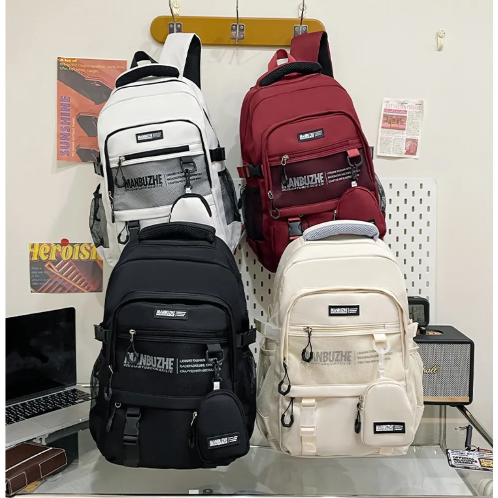 Lightweight nylon fabric, large-capacity student schoolbag, loose change bag, multi-pocket waterproof travel backpack