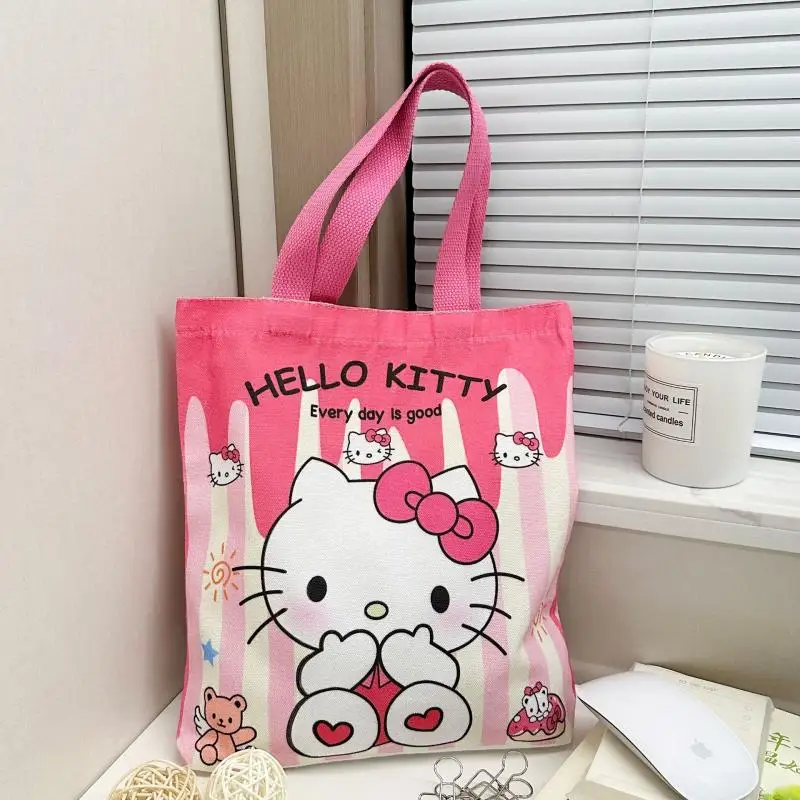 

Новая сумка через плечо Hello Kittys Sanrios, холщовая сумка с героями мультфильмов, сумка на плечо для девочек, студенческая милая сумка для обеда с героями мультфильмов Kawaii, сумка для покупок