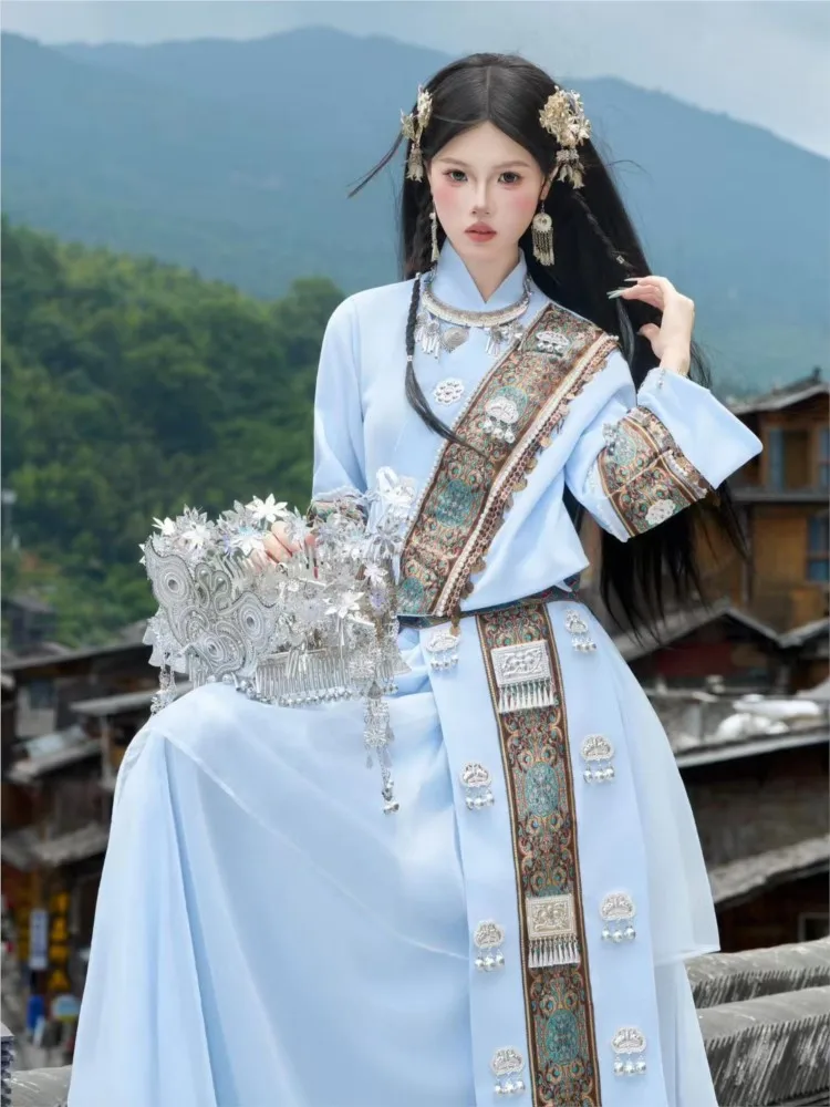 

Blue and white top with a flowing chiffon skirt for photography travel outings