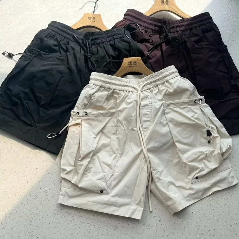 

Однотонные шорты в стиле сафари для мужчин и женщин, летние эластичные шорты с большим карманом, быстросохнущие спортивные свободные повседневные шорты большого размера