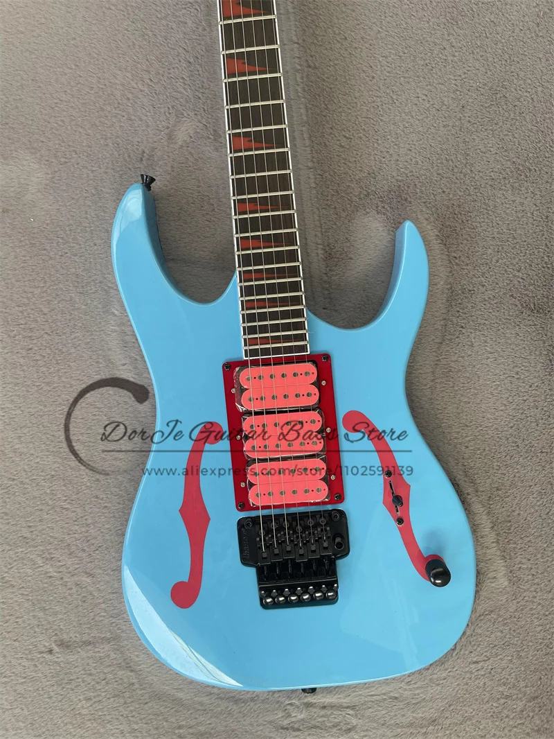 Light Blue Electric Guitar Pink Pickups Tremolo Bridge Rosewood Fingerboard Red Inlay Black Tuners