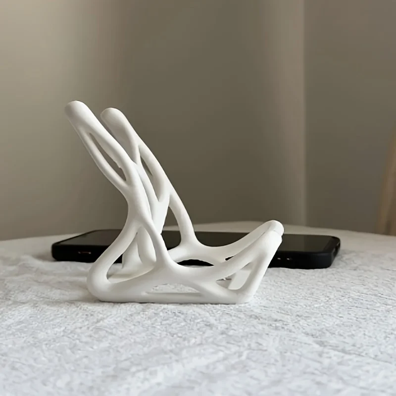 2-Pack Abstract Hollow-Out Phone Stand with 3D Printed Bionic Skeleton Design, Decorative Ornament for Phone Stand, Suitable for Study Room and Living Room, Ideal for Watching Shows
