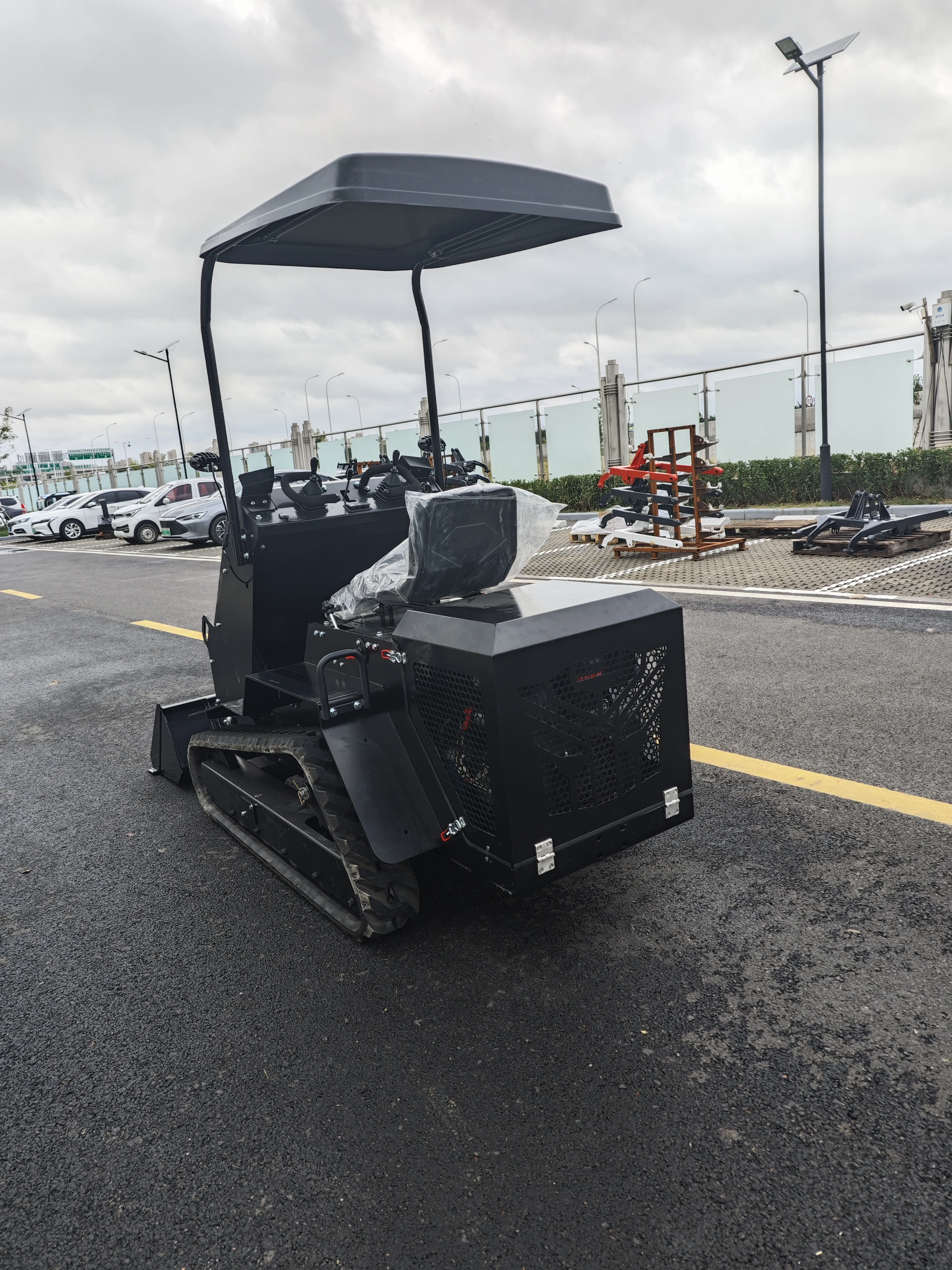 Mini minipala compatta personalizzata di alta qualità con accessori Skid Steer cingolato