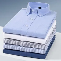 Nueva camisa Oxford de algodón 100% de calidad, camisas de vestir sociales de manga larga para hombres, ropa informal suave y cómoda de ajuste Regular para hombre