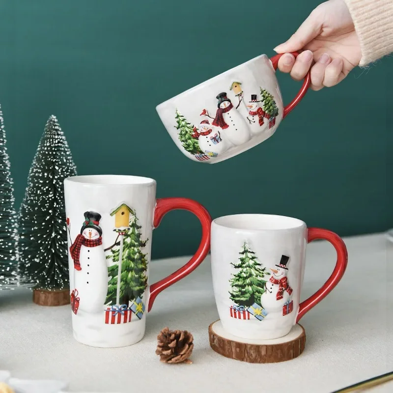 

Christmas snowman ceramic coffee cups, embossed cutlery, holiday gift ideas.