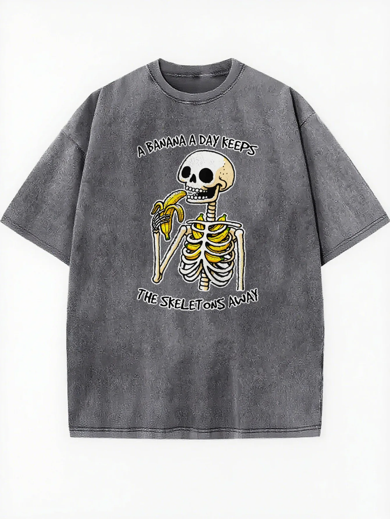Esqueleto engraçado A BANANA A DAY KEEPS THE SKELETONS AWAY Camiseta feminina solta com gola redonda e lavada, adequada para todos os anos