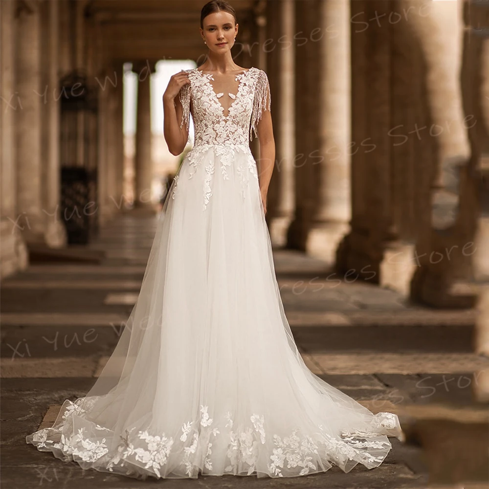 Sexy alla moda con scollo A V una linea abiti da sposa da donna eleganti Appliques abiti da sposa in pizzo senza maniche Backless Vestido De Noivas