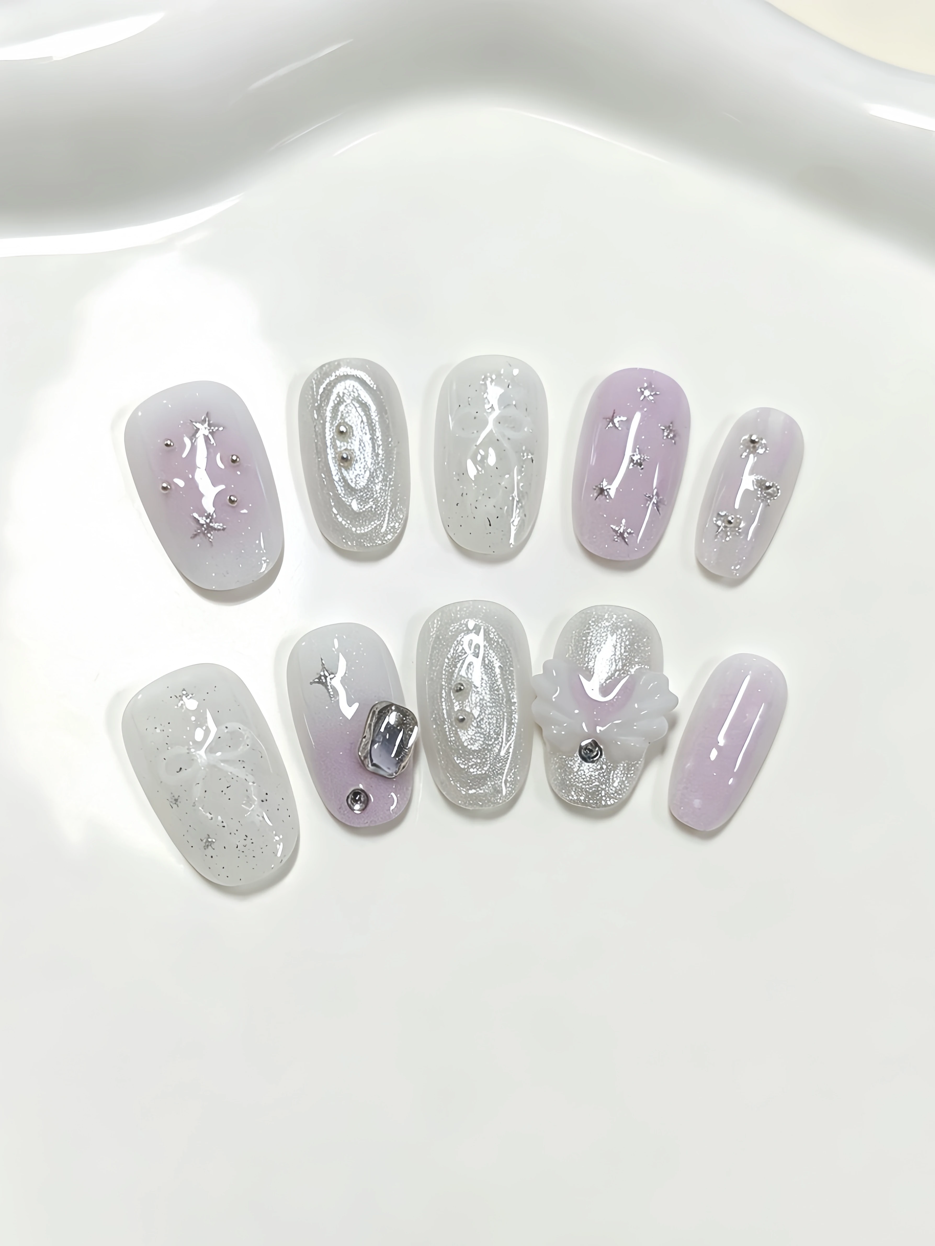 10 Pieces of Short Oval Press-On Nails, Gradient Pink and White Angel Wings with Milky White Fine Glitter Base Nail Stickers, Silver Four-Pointed Star Shimmering Diamond Galaxy Texture Nail Pieces, Ins-Style Gentle Commuting Style Versatile Fake Nails for the Workplace