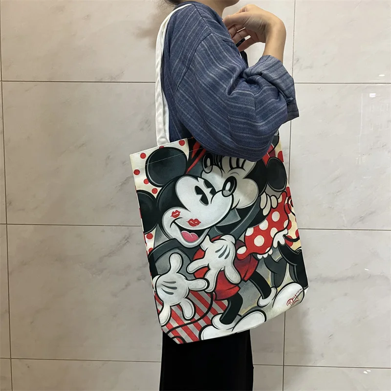 

MINISO Disney Mickey Mouse Mini cartoon canvas portable shoulder bag student couple leisure shopping bag