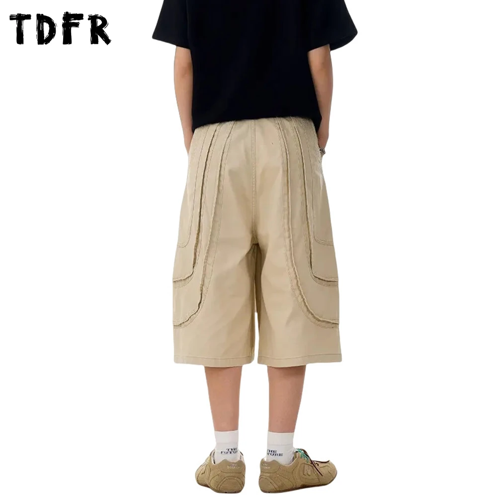 Shorts de carga emendados masculino bolso cor sólida retro streetwear solto perna larga algodão shorts casuais masculino meia calça