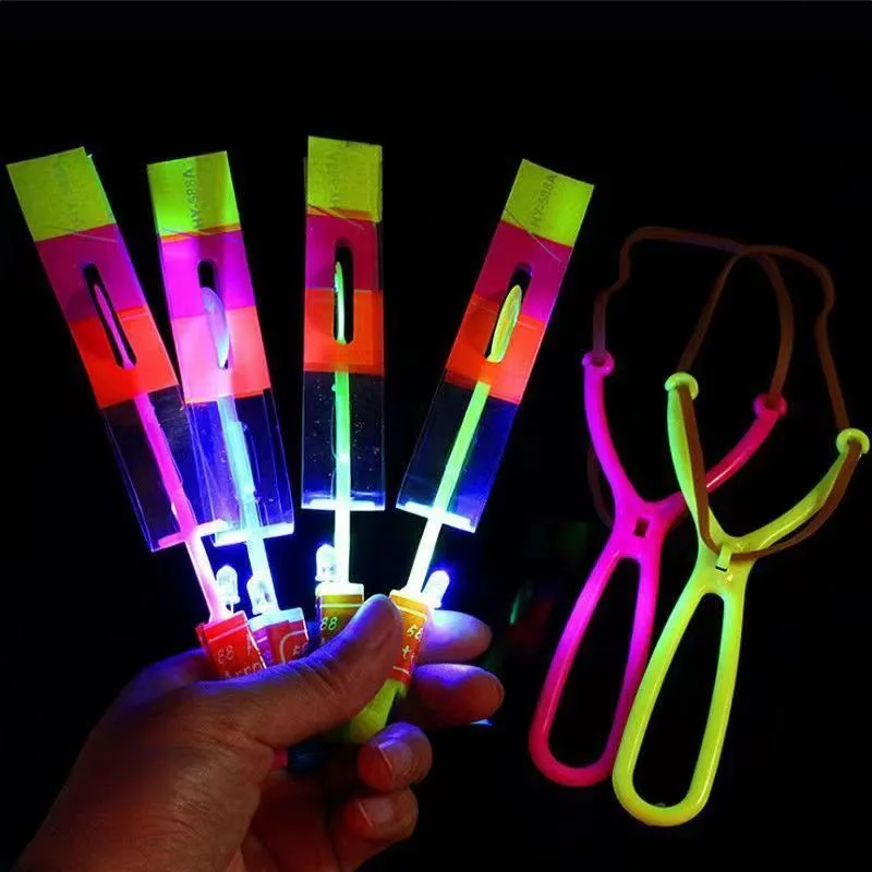 5Pcs Amazing Light Arrow Rocket Helicopter Flying Light Glow In The Dark Party Fun Gift Rubber Band Catapult