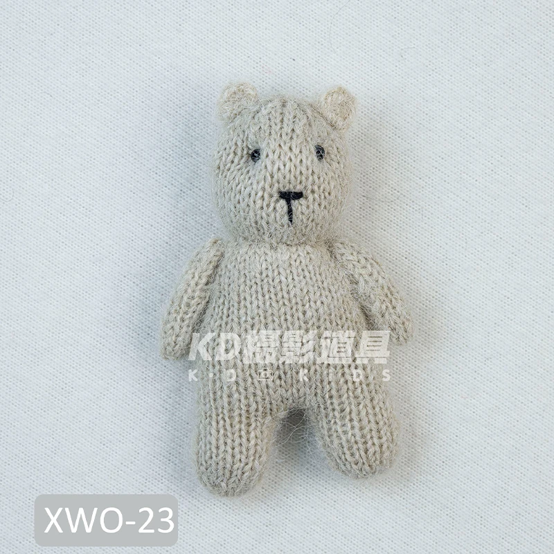Giocattolo di orsacchiotto lavorato a maglia mini bambola fatta a mano Fotografia di neonato Prop 15 * 10 * 5 cm Giocattolo di comfort per animali neonato Disponibile per l'acquisto sfuso