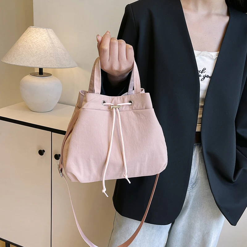 

2025 Trendy Women's Nylon Crossbody Bags Drawstring Shoulder Purse Compact Travel Tote Lightweight Commuter Handbag Small Wallet