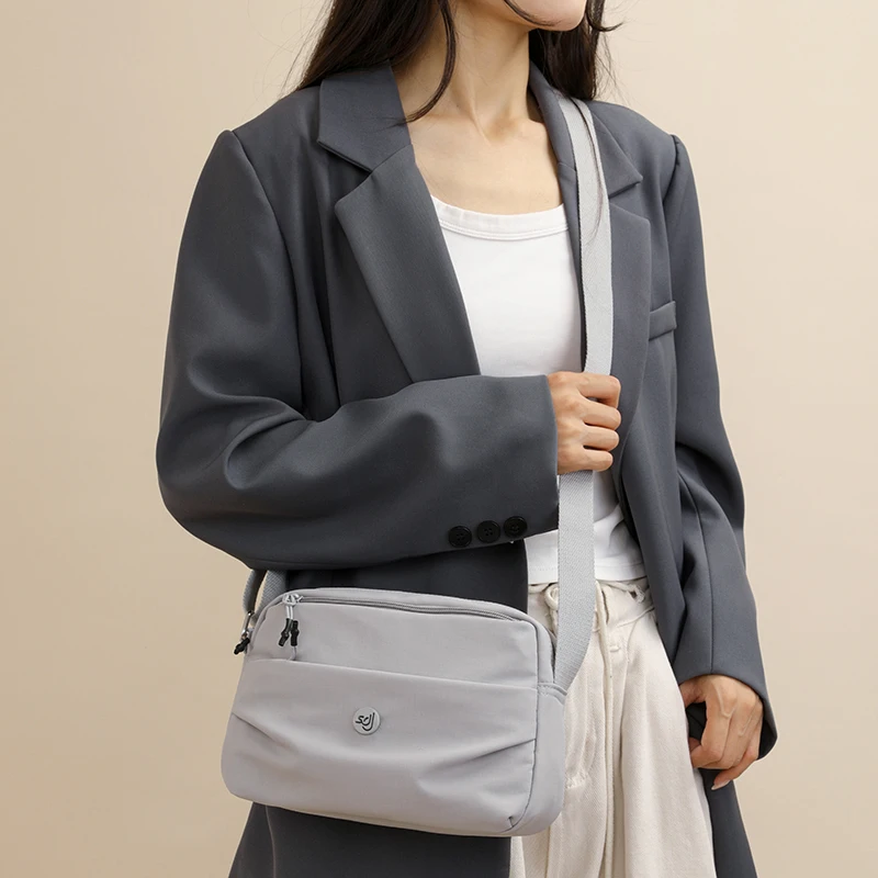 النسخة الكورية الجديدة حقيبة قماش نايلون ملونة معكرون متعددة الاستخدامات للسفر حقيبة مربعة صغيرة حقيبة كروسبودي حقيبة كتف حقيبة نسائية