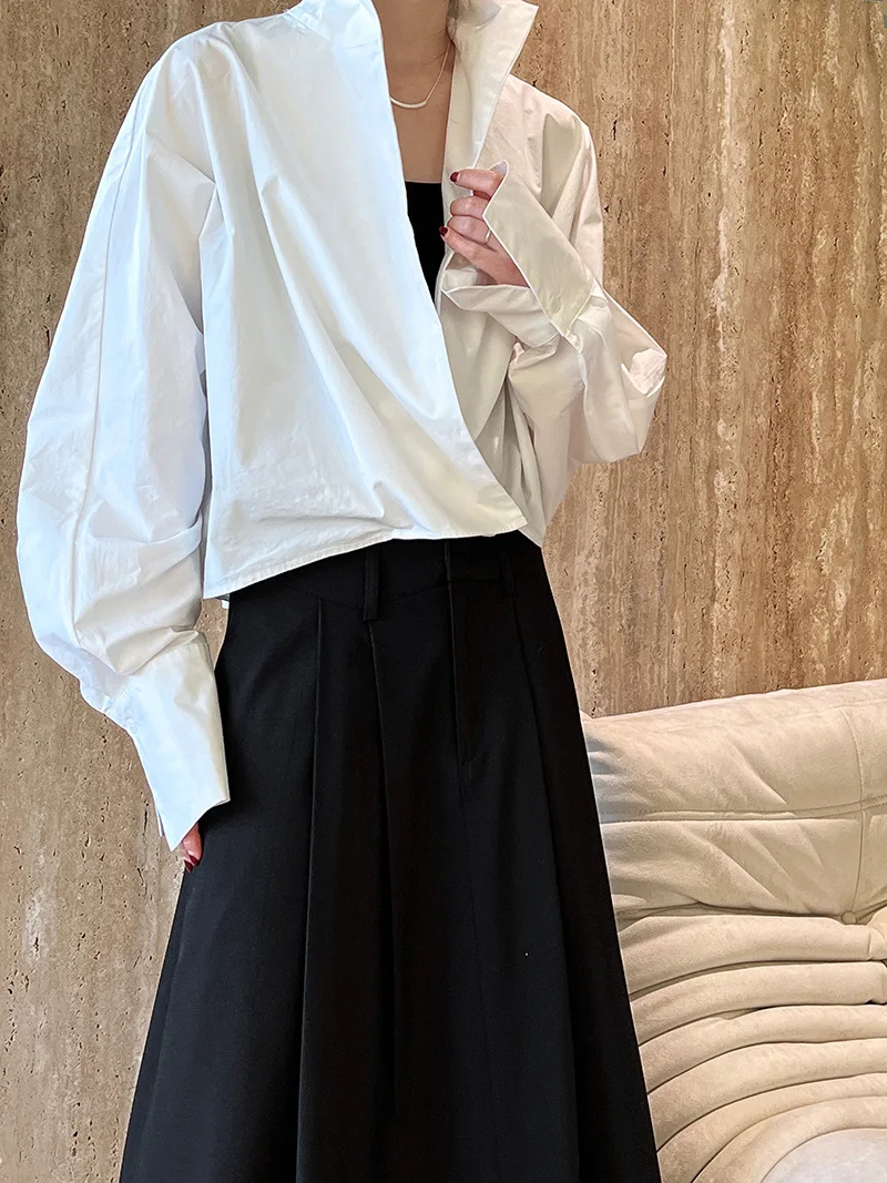 

Fashion White Silhouette Shirt Women's Stand Collar Cross Loose Long Sleeves Sense Of Design Blouse New Tide
