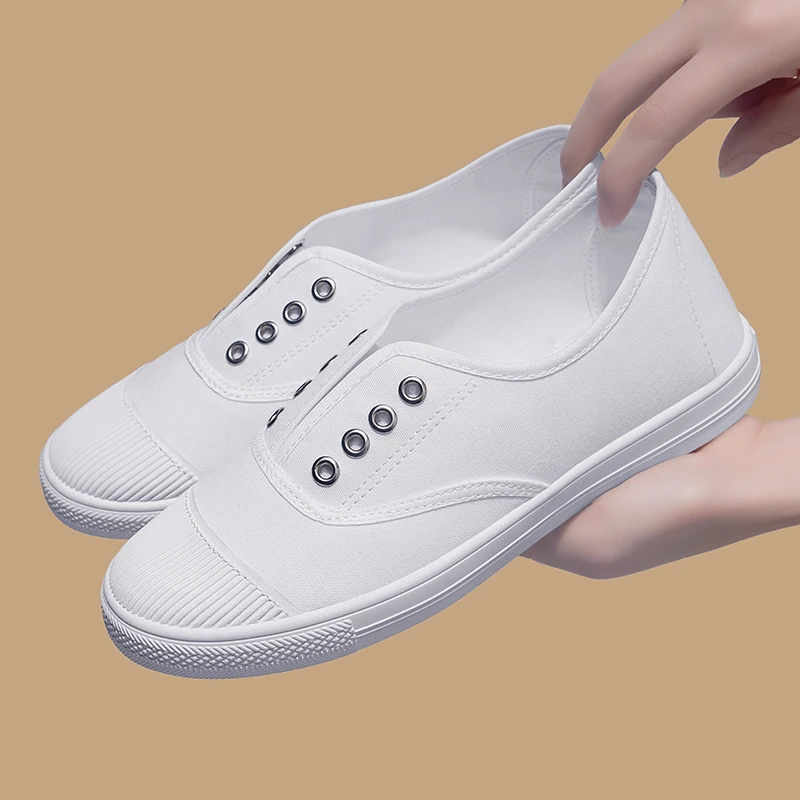 

Женские слипоны из канваса: дышащие, модные, низкие, с круглым носком, на резиновой подошве, удобные, с металлическими элементами, молодежные