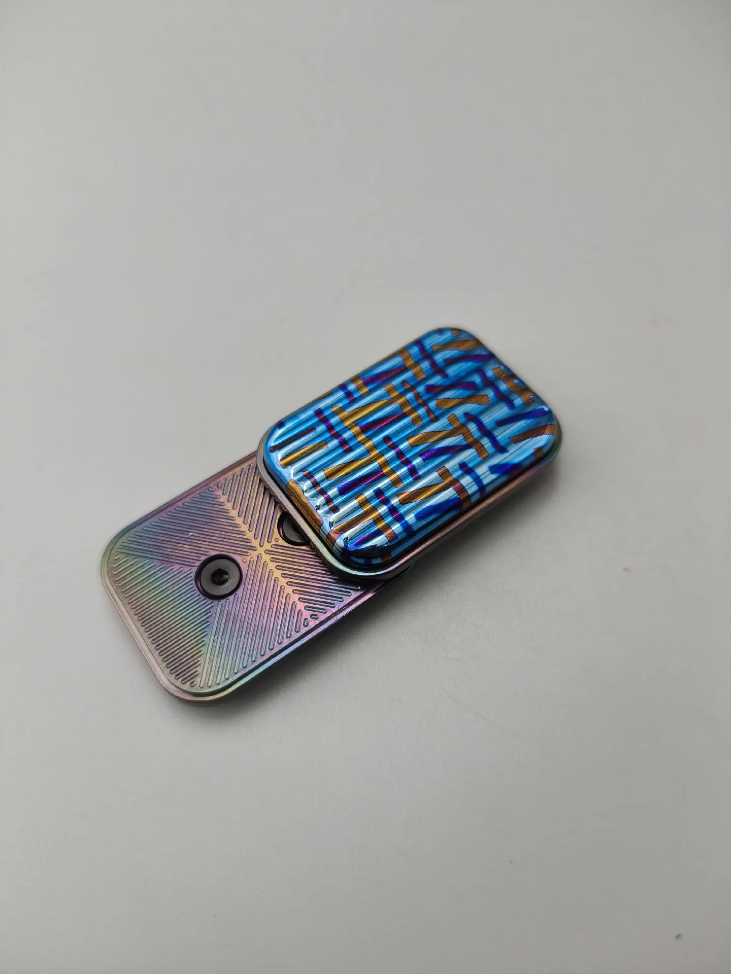 Titanium horse woven pattern travel case EDC infinite push plate