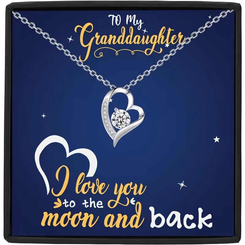 Featuring a Heart-Shaped Necklace for Your Granddaughter, Accompanied by a Card That Says, 'I Love You to The Moon And Back.'