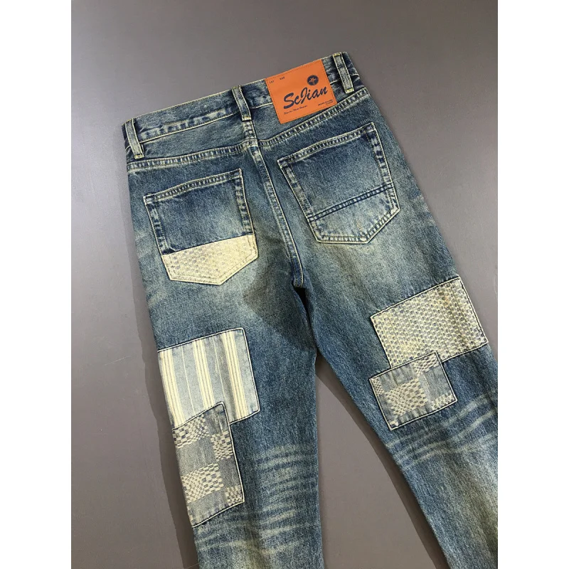 Męskie jeansy high-end, łączone, ciężkie, retro, o prostym kroju, modne, z charakterem, długie spodnie w stylu retro.