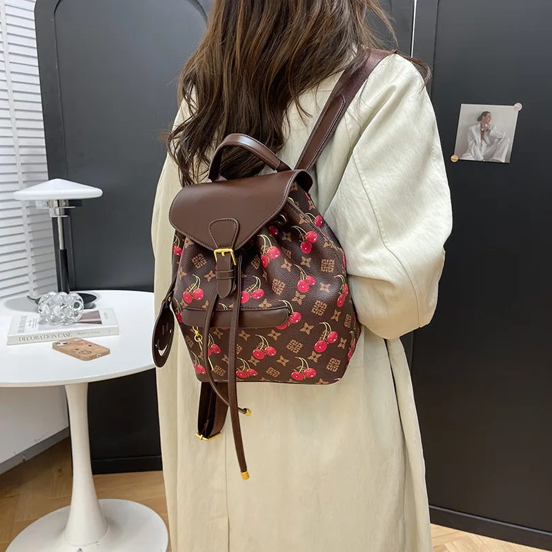 

2025 Convertible Backpack for Women Color Block Monogram Shoulder Bag Spacious Travel Rucksack with Laptop Sleeve​