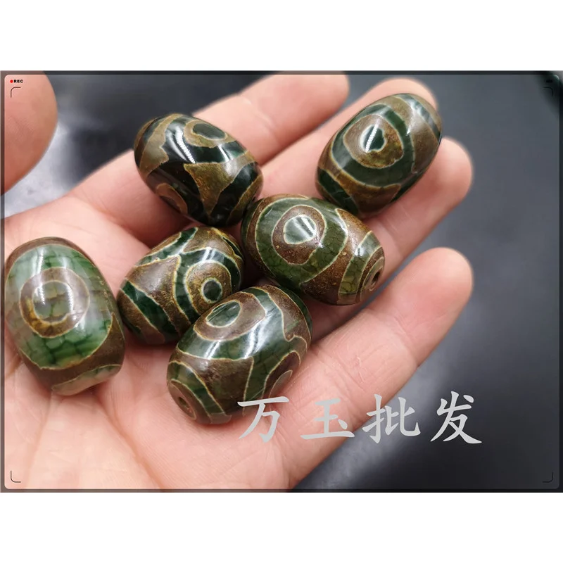 خرز عقيق Tianzhu ذو ثلاث عيون فضفاض