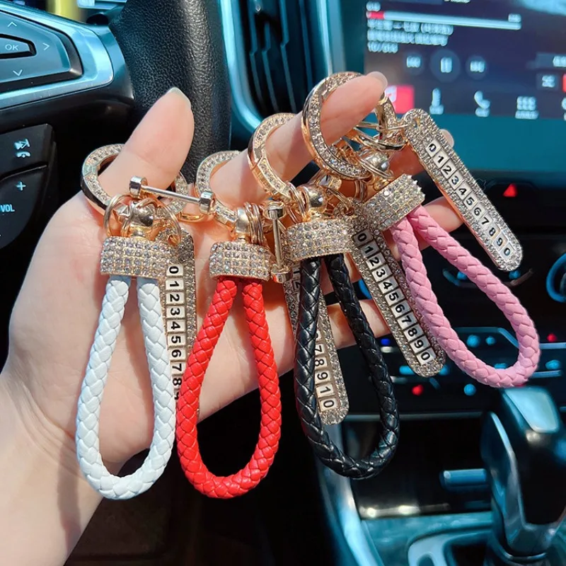 Creative and fashionable car keychain, leather handmade woven rope, full of diamonds, number plate, anti loss keychain ring