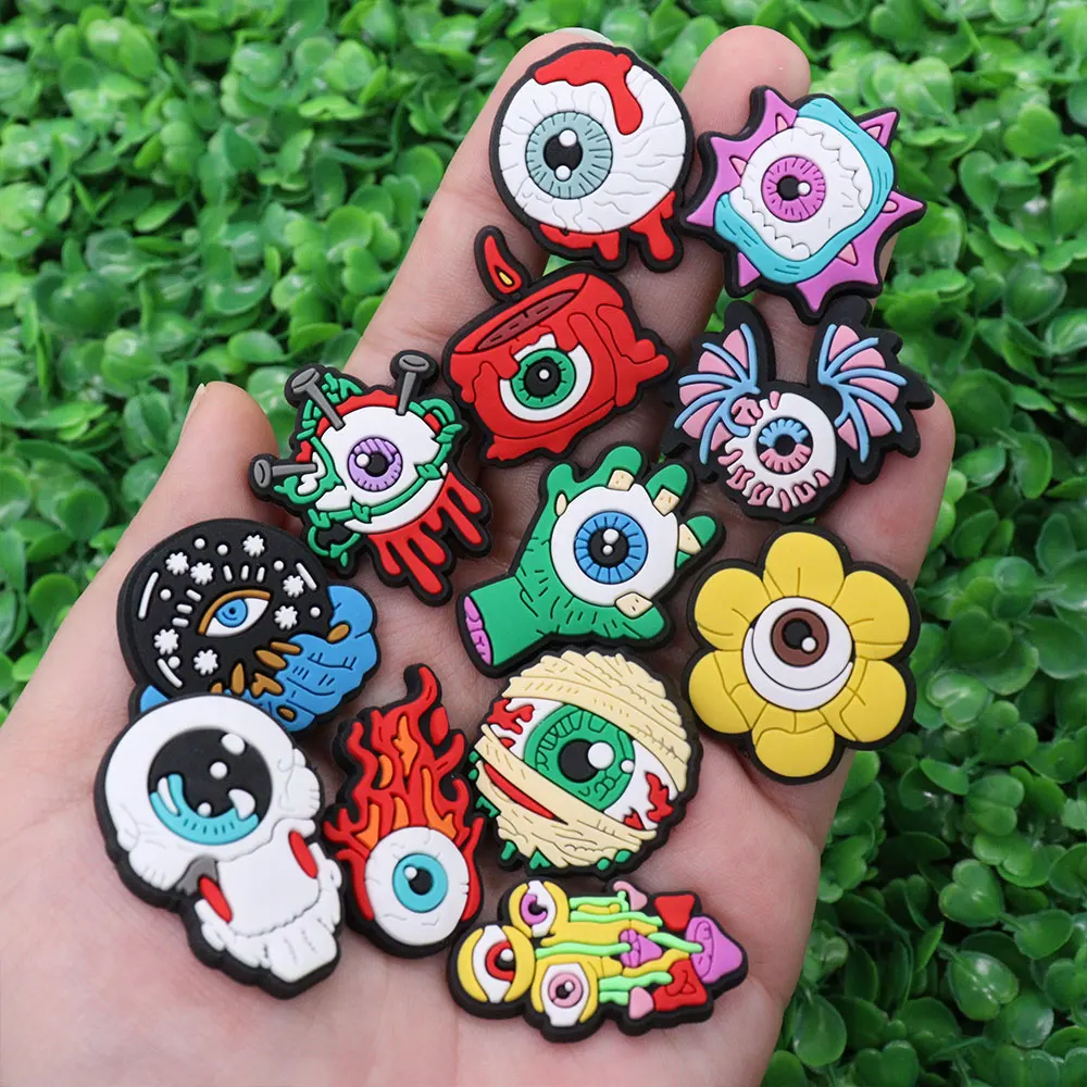 Mix 50pcs PVC Shoe Charms Horrible Eye Flower Candle Mushroom Fire Hand Hole Slipper Decoration Accessories Fit Wristbands