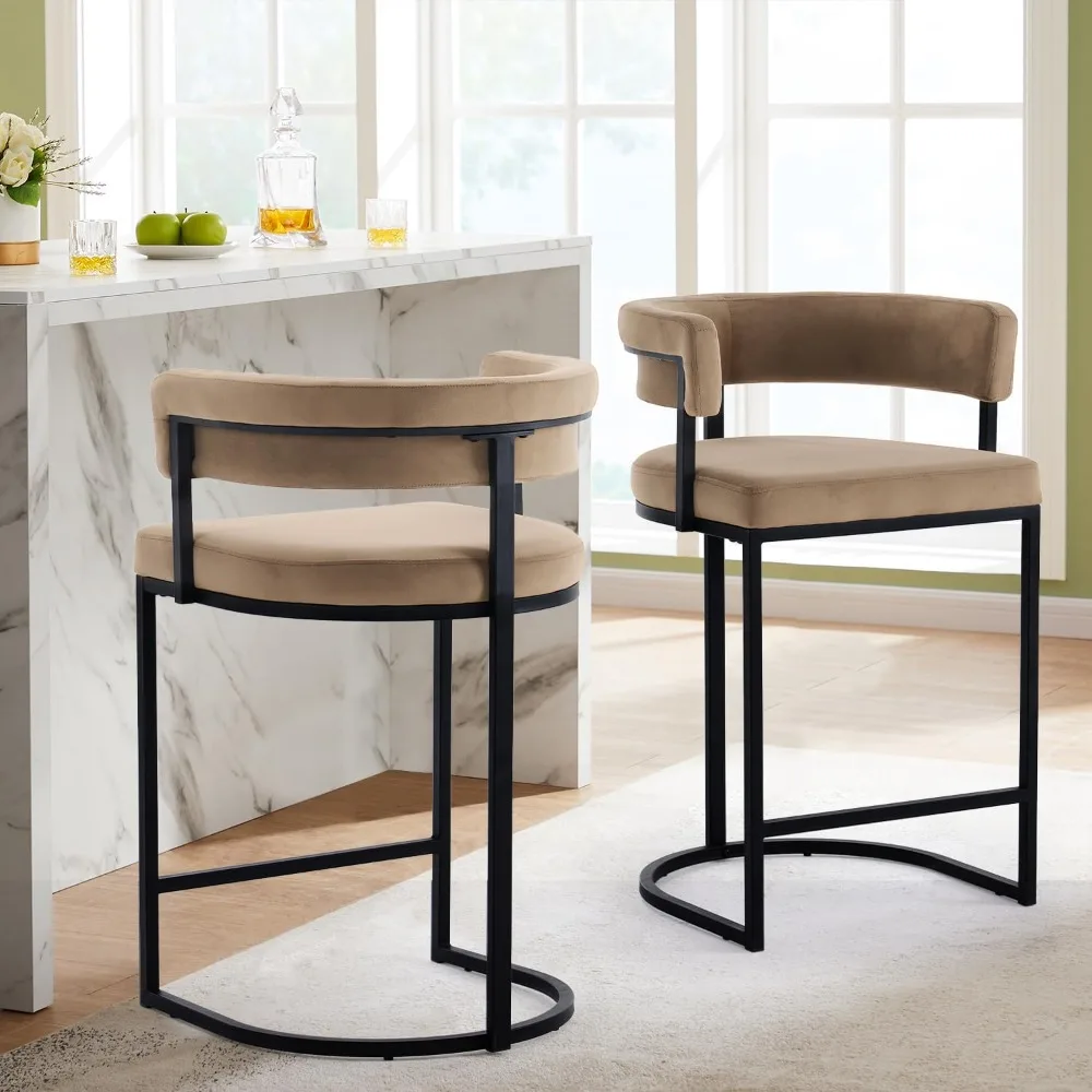 

A set of 2 brown modern velvet bar stools with bucket shaped backrests, cushioned seats, and black metal footrests