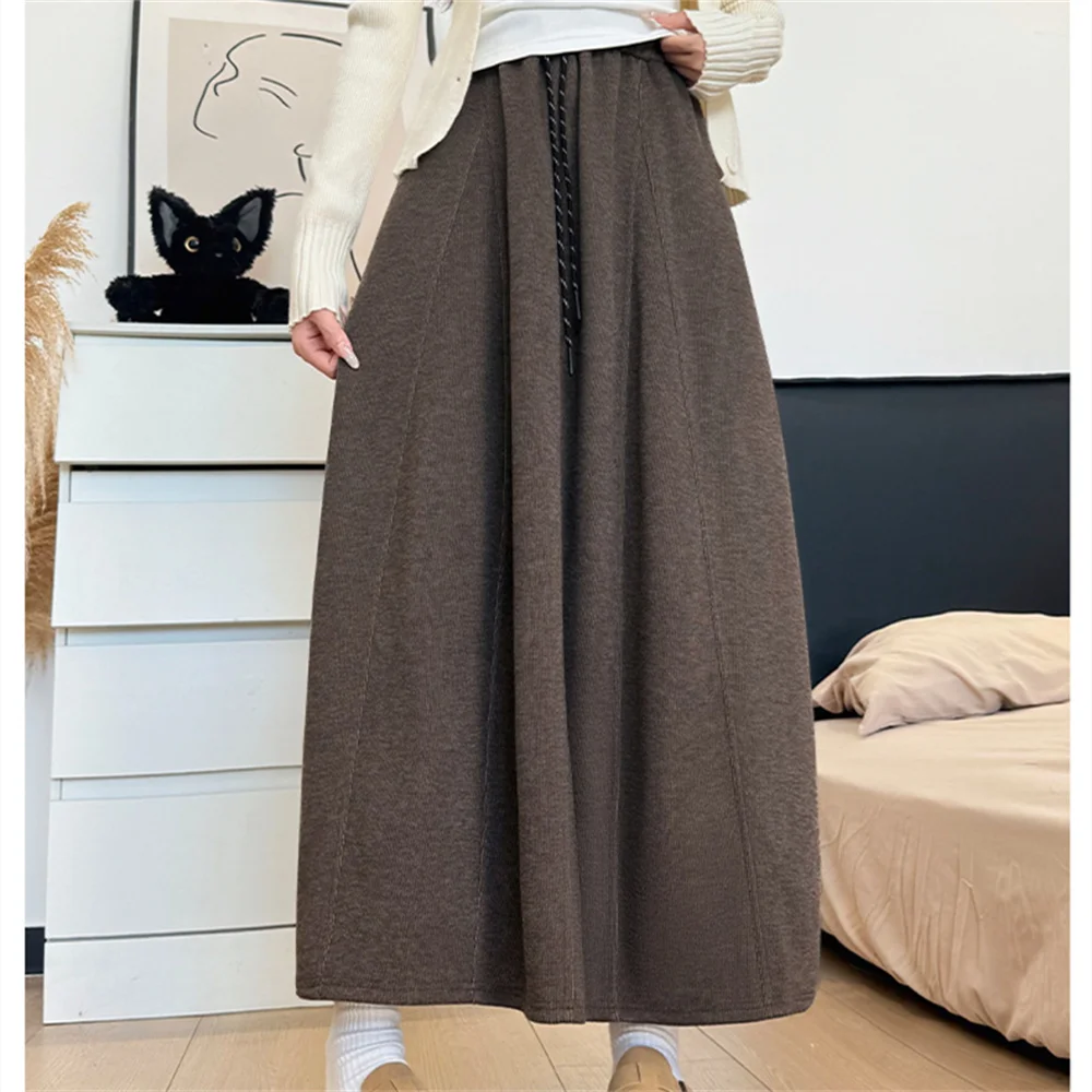 تنورة طويلة برباط عالية الخصر لربيع 2025 للسيدات للخريف والشتاء تنانير متوسطة الطول دافئة للسيدات تنورة ماكسي كورية بلون واحد #1