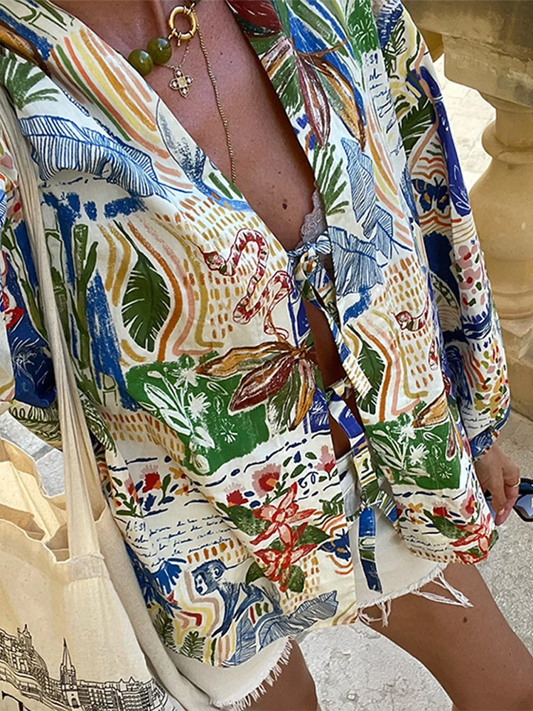 Camicie stringate con stampa floreale allentata alla moda per le donne camicetta da spiaggia elegante con maniche lunghe a lanterna New Street Causal Lady Chic Tops