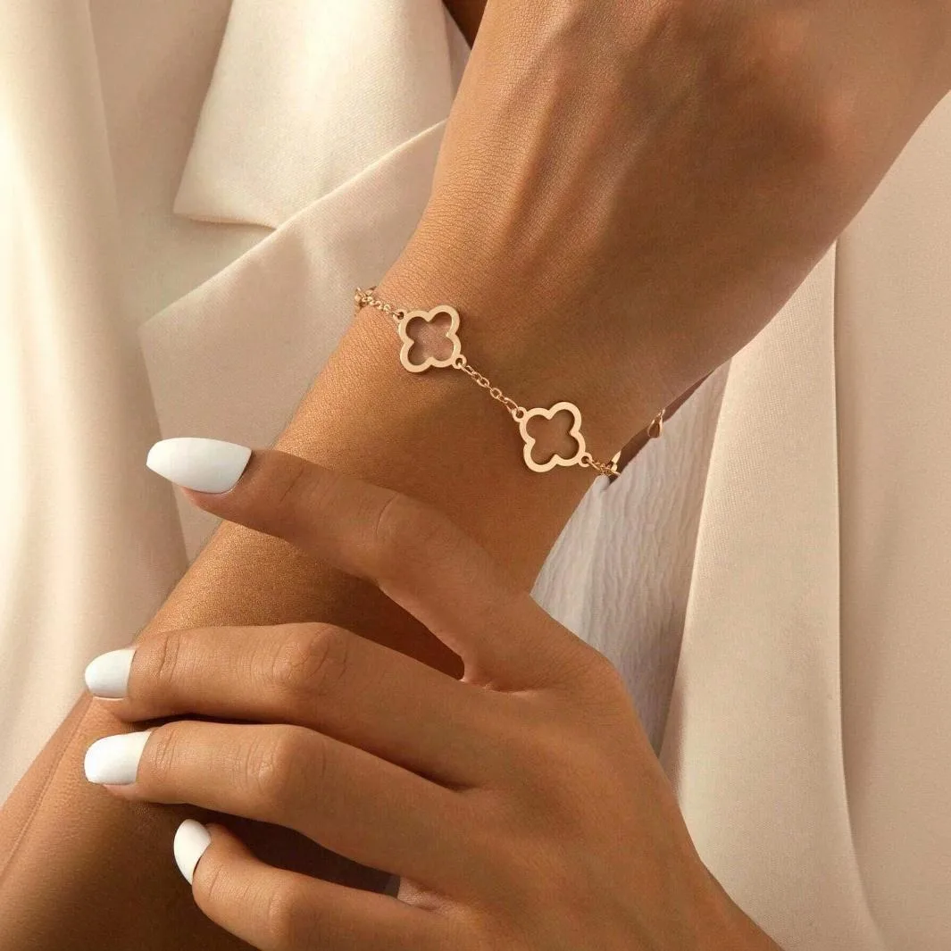 

Not-Fading Gold Plated Lucky Hollow Four Leaf Clover Pendant Bracelet Ladies Adjustable Chain Women Fashion Party Jewelry Gift