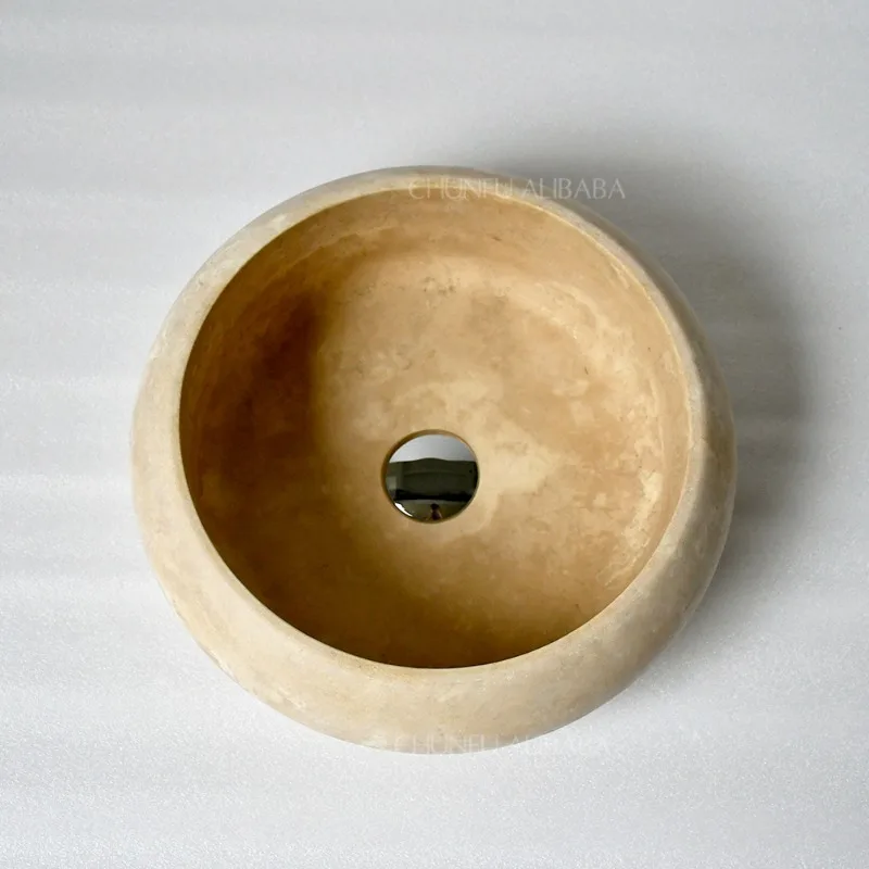 

Современная раковина для ванной из травертина в форме пещеры может быть изготовлена на заказ с полированной поверхностью.