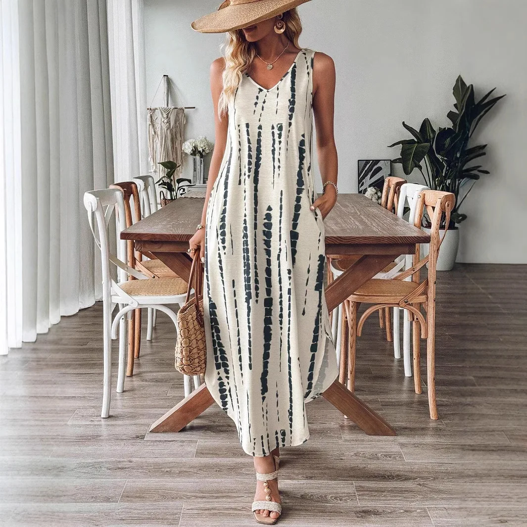 Modieuze vrijetijdsjurk Mouwloze zomerjurk met losse split en print V-hals Kleurblokken Print Mouwloze lange jurk voor dames