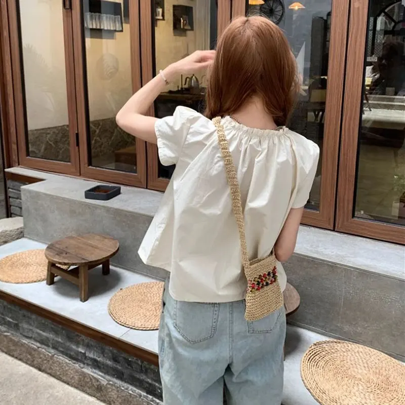 シャーリング無地シャツ女性服甘い半袖夏フレンチスタイルカジュアルひだルーズ O ネックブラウス新