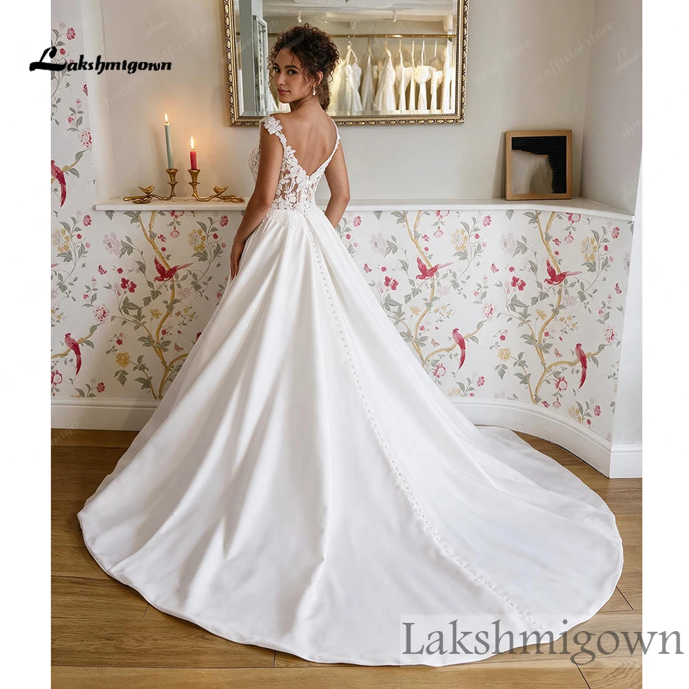 Lakshmigown Brautkleid mit freiem Schulterbereich, Perlen, floraler Spitze, Illusionsoberteil, Satin, mit seitlichem Schlitz, nach Maß gefertigt. – Detail 6