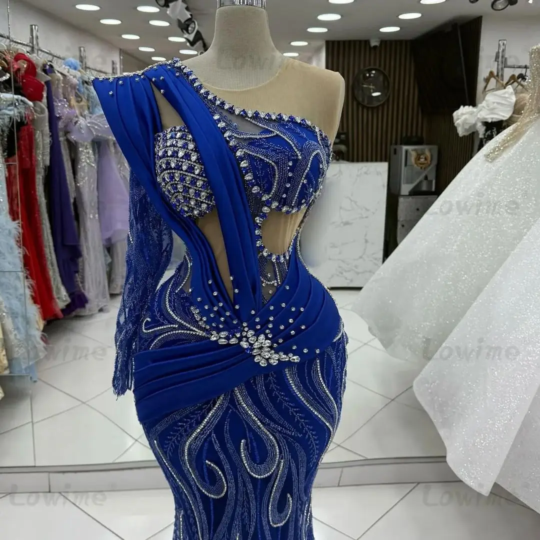 فساتين سهرة بحورية البحر باللون الأزرق الملكي بكتف واحد لعام 2025 فستان حفلات عربي مطرز بالكريستال فساتين المشاهير فساتين حفلات مخصصة