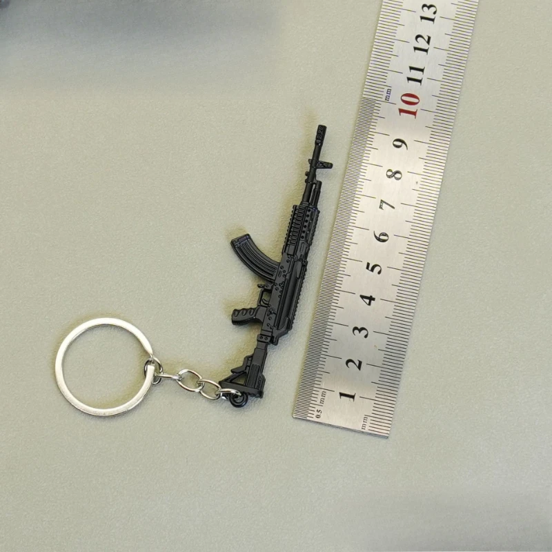 9cm/3.54in Peace Game peripheral Mini Gun Keychain M4A1 Barrett Metal Gun Weapon Model Backpack charm Fine Crafts Boys Gift Toys