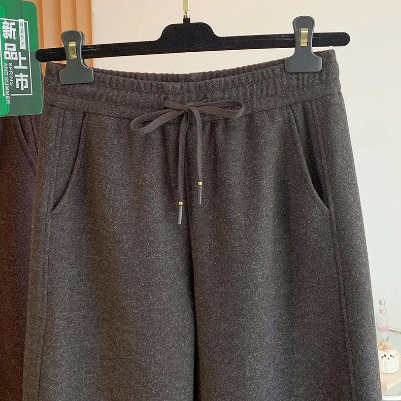 Zimowe wełniane spodnie z szerokimi nogawkami, damskie luźne spodnie o prostym kroju, modne spodnie uniwersalne, długie spodnie.