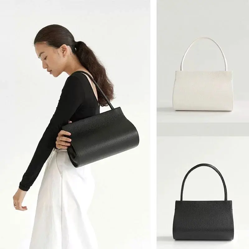 

Корейская нишевая высококачественная овальная сумка-труба, женская простая сумка на плечо во французском стиле ретро, портативная летняя сумка подмышками, индивидуальная изысканная сумка для отдыха