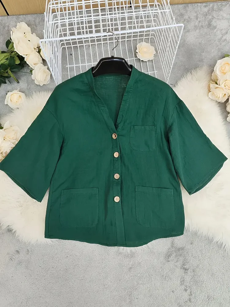 Plus Size Green Linen Blouse for Curvy Women. V-neck half sleeve button shirt with multi pockets. Oversized loose fit perfectly view 3