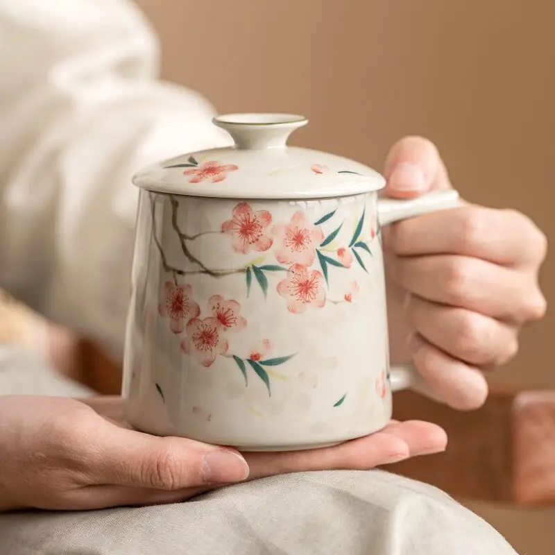 

Chinese hand-painted peony ceramic cup with lid, suitable for women, featuring a high aesthetic design, and has a tea separation