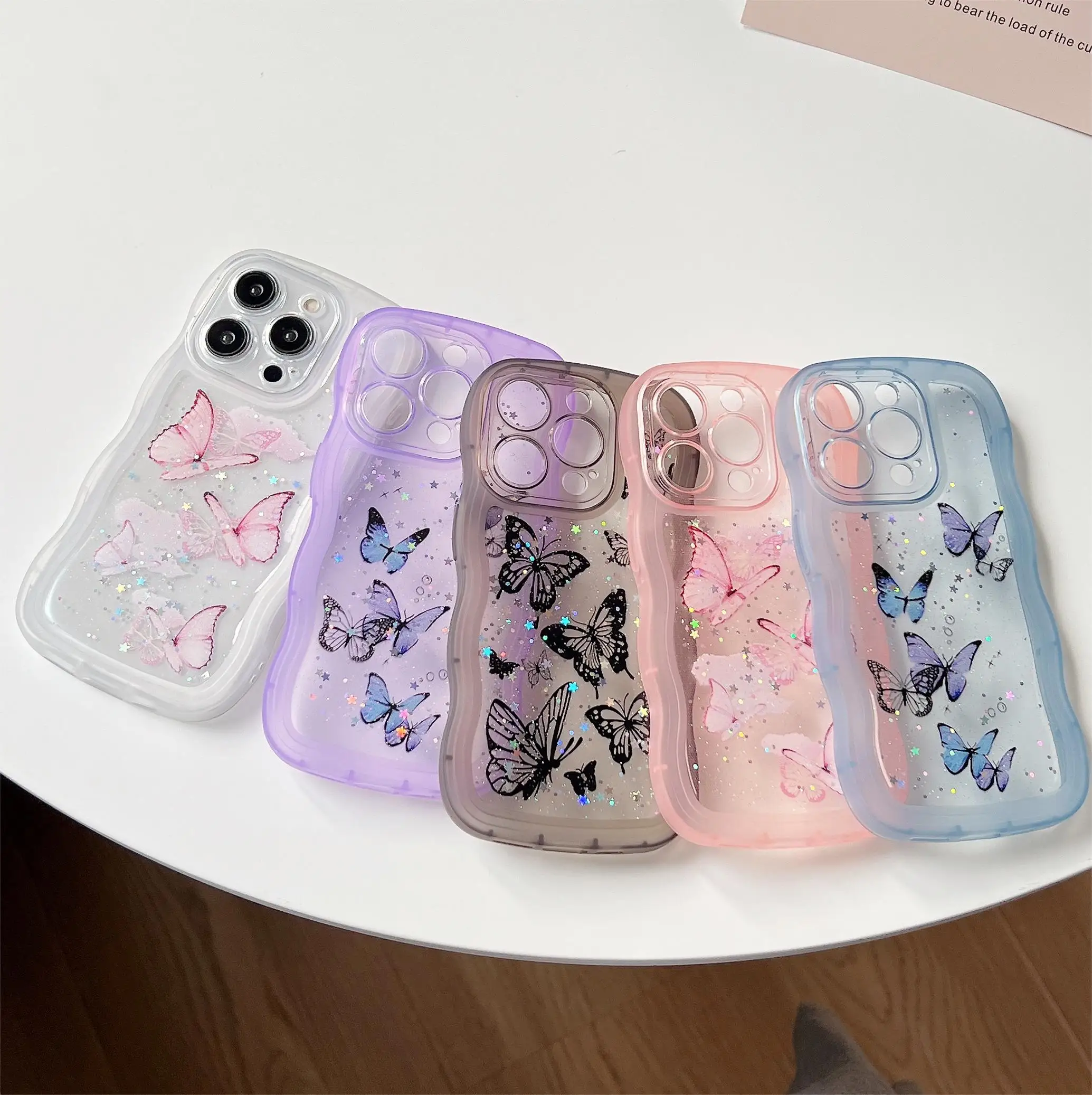 เคสโทรศัพท์เรซิ่นลายผีเสื้อประกายดาวหรูหรา ขอบหยักแบบไม่สม่ำเสมอ สำหรับ iPhone 11 12 13 14 15 16 17 Pro Max + Plus