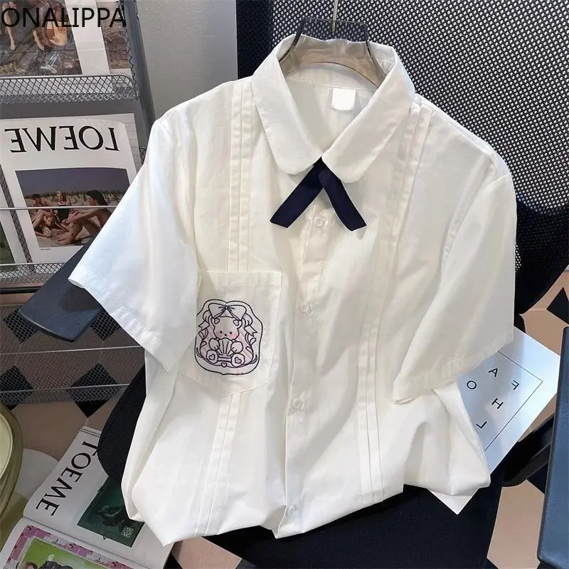 

Onalippa Doll Short Sleeved Japanese Cute Student Shirt 2025 Summer Women Korean White JK Uniform Loose College Teddy Bear Tops