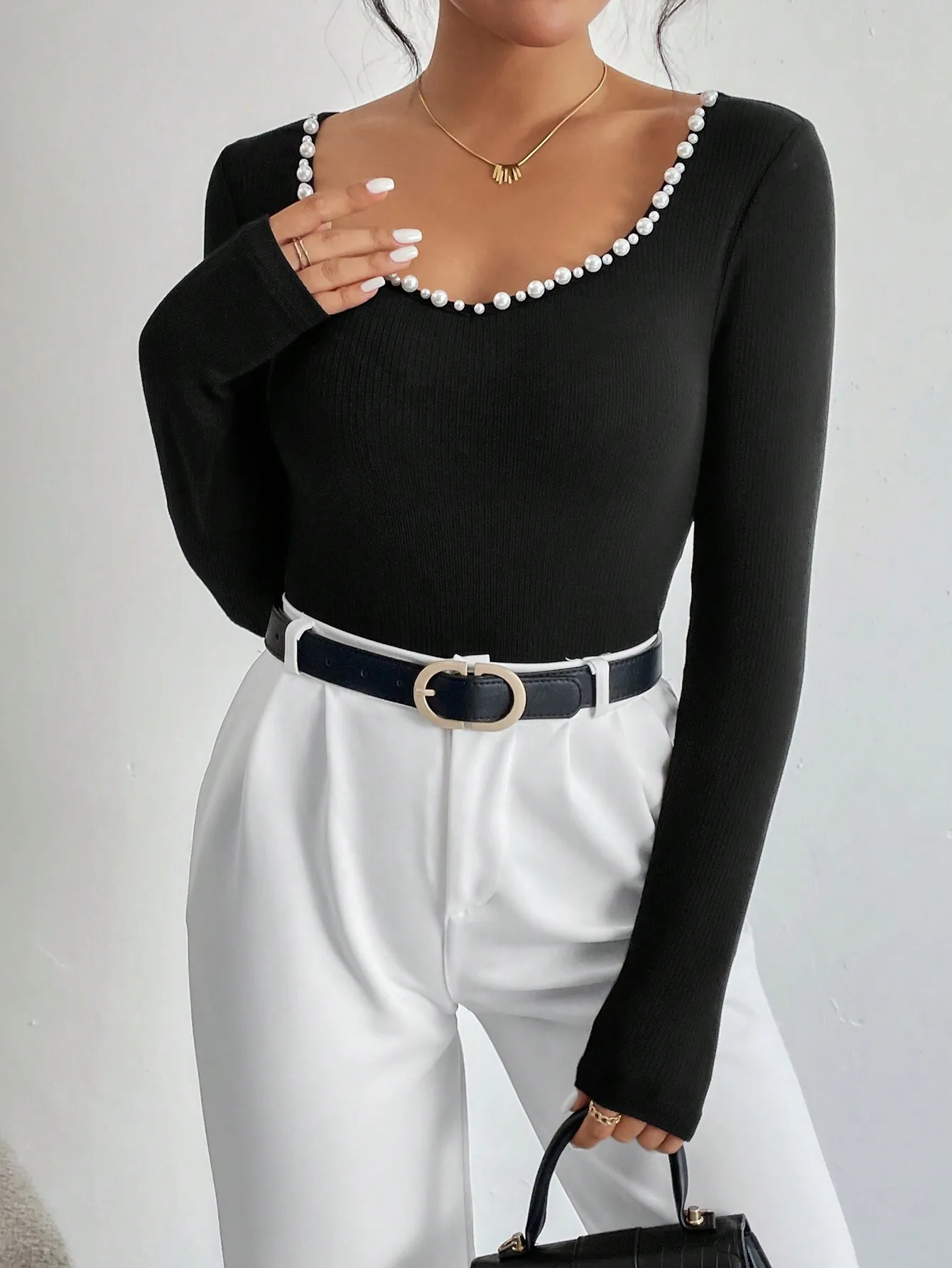 

Black Ribbed Knit Bodysuit with Pearl-Trimmed Sweetheart Neckline