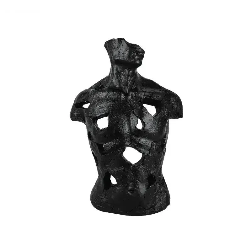 Sculpture de figure abstraite en résine noire et blanche,